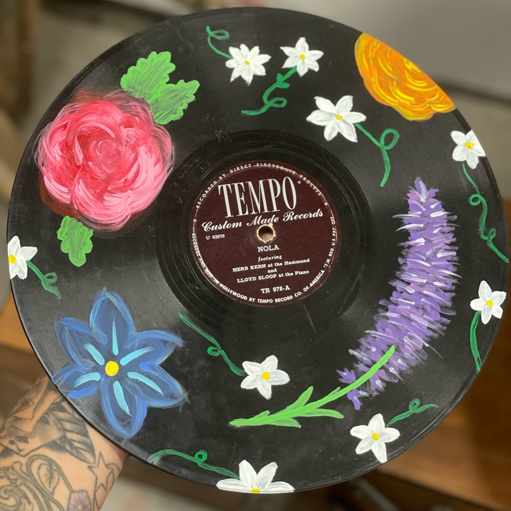 Hand painted vinyl record.